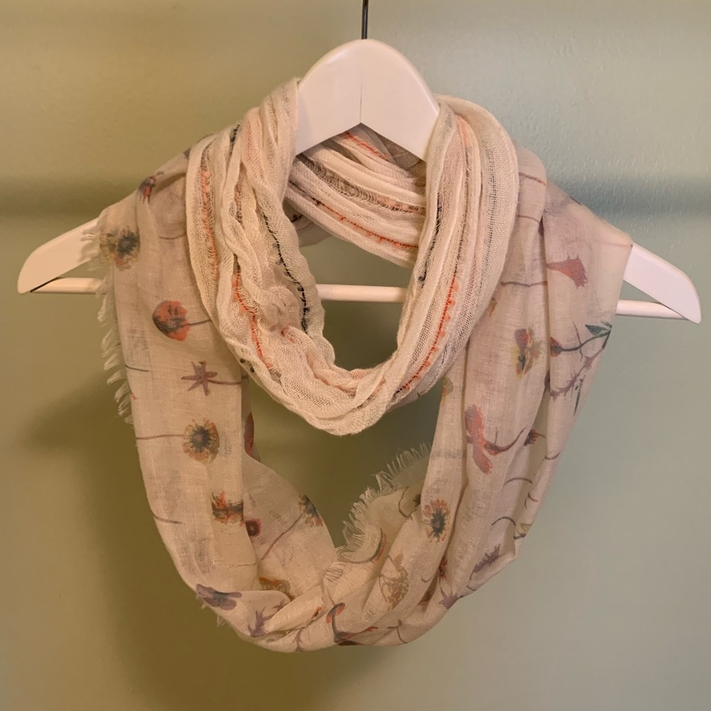 Dual-patterned infinity scarf.